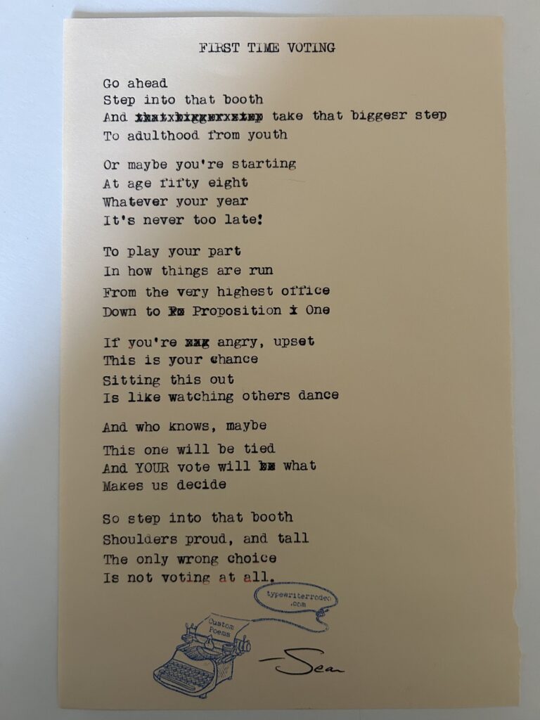 A photo of the typewritten poem on a torn half-sheet of light yellow paper.